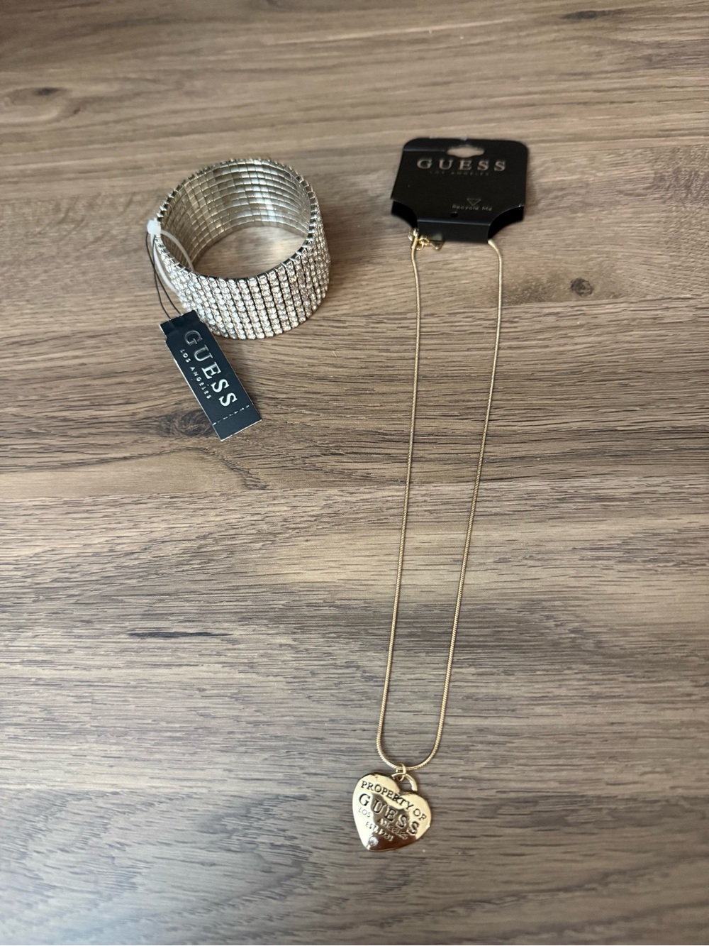 Brand new GUESS Gold Heart Pendant Necklace and Silver Crystal Bracelet Set